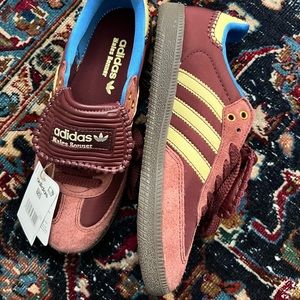 Burgundy adidas shoes